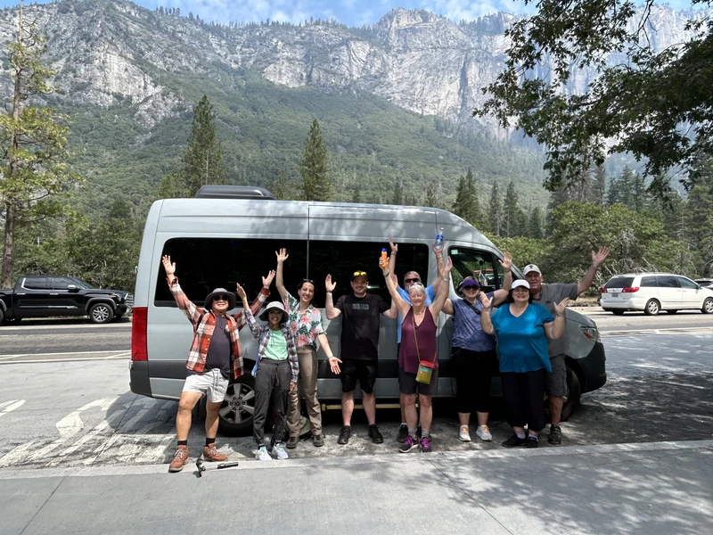Starlight Taxi sprinter van with a tour group at Yosemite National Park.